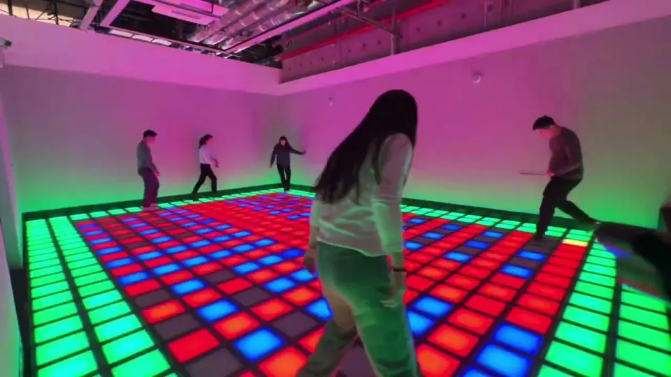 Colleagues playing floor is lava together during a team session